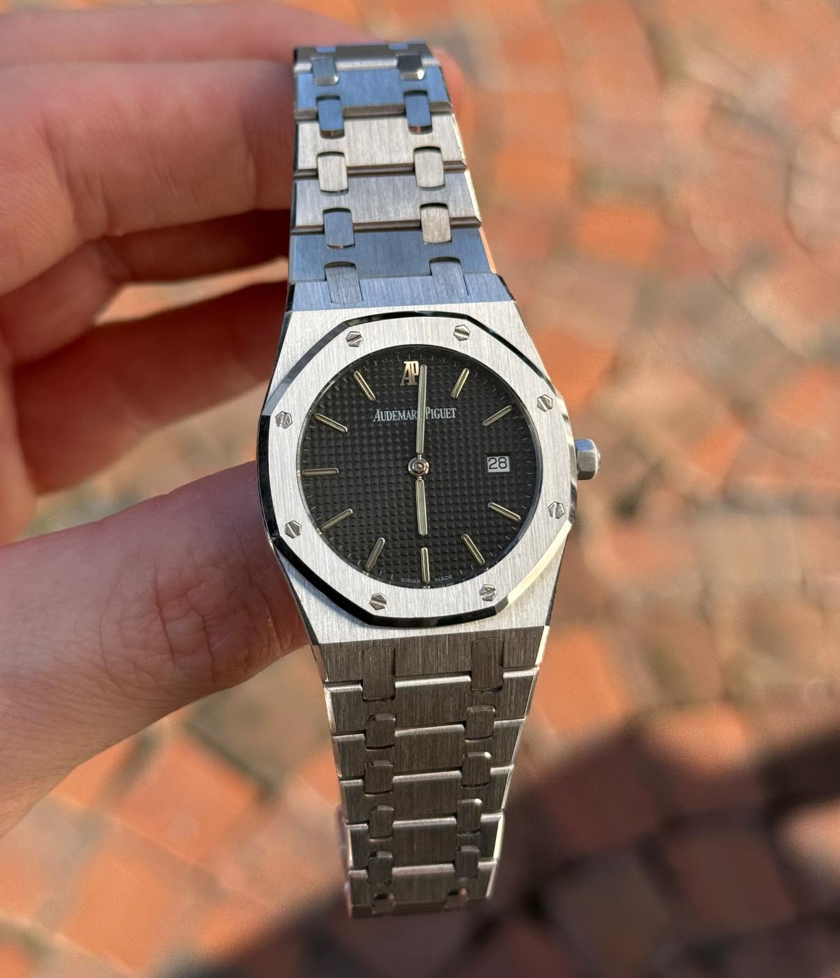 May be an image of wrist watch and text that says '0 福 s ALDEMA ALDEMARPIGUET IGUET קו e 28 ၇ ก 春'