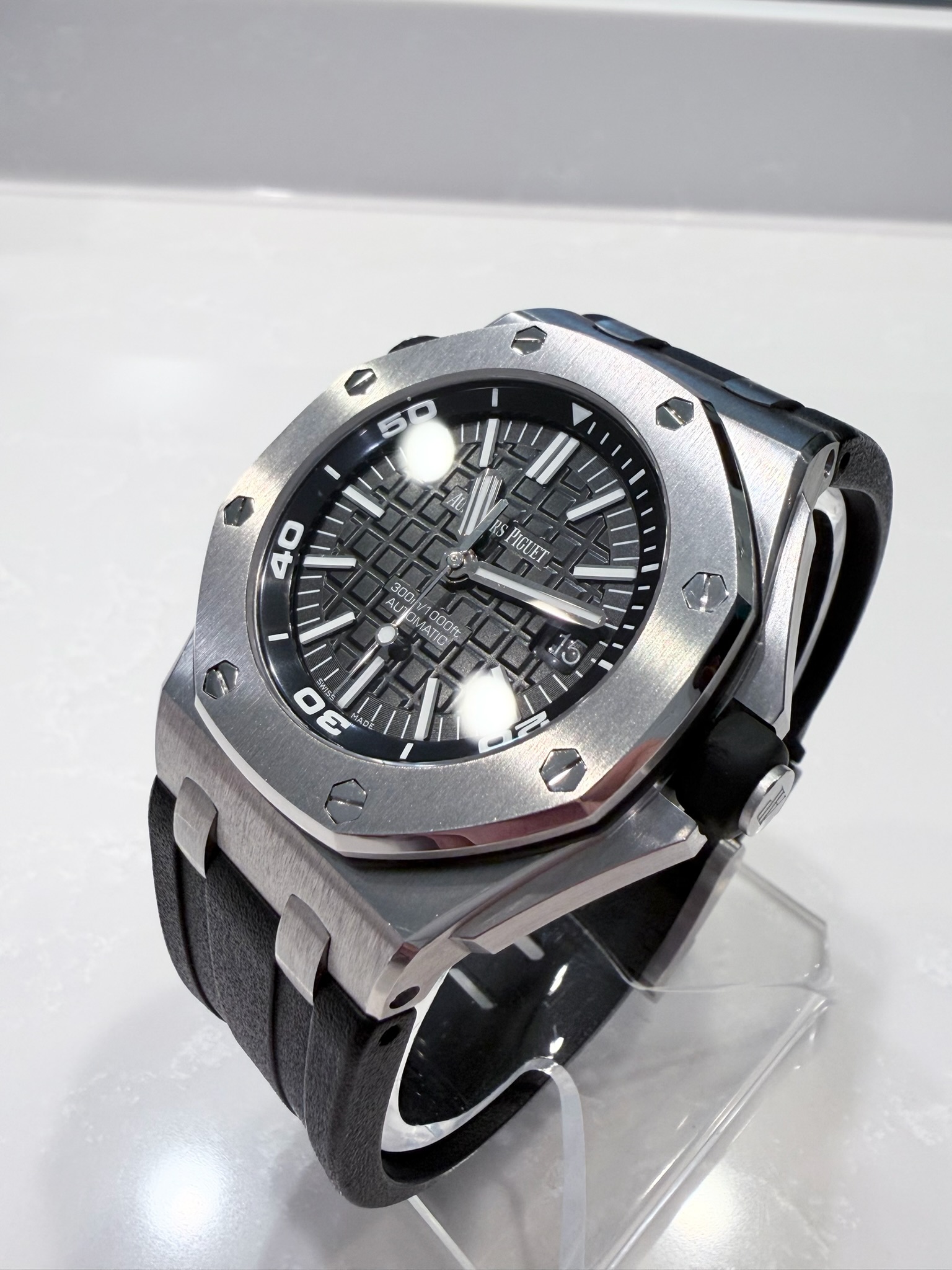 May be an image of wrist watch and text