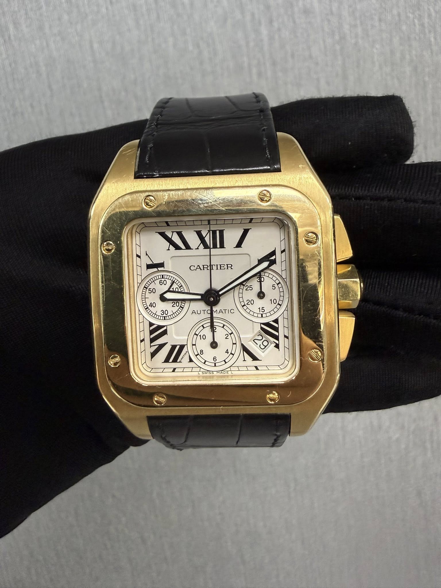May be an image of wrist watch and text that says 'XXII/ I ٢ HET 60 50 50 CARTIER 25 40 20= 京さい 30 30、 표 5 10 0 O 20 AUTO MATIC 10 2 2 I 8 O 6 6 6 29'