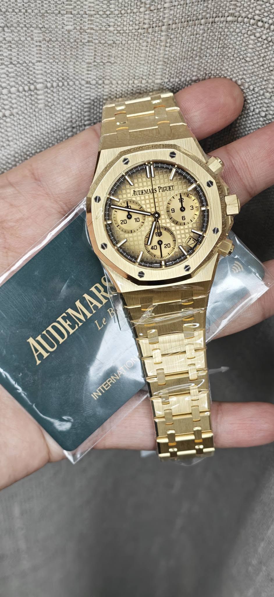 May be an image of wrist watch and text