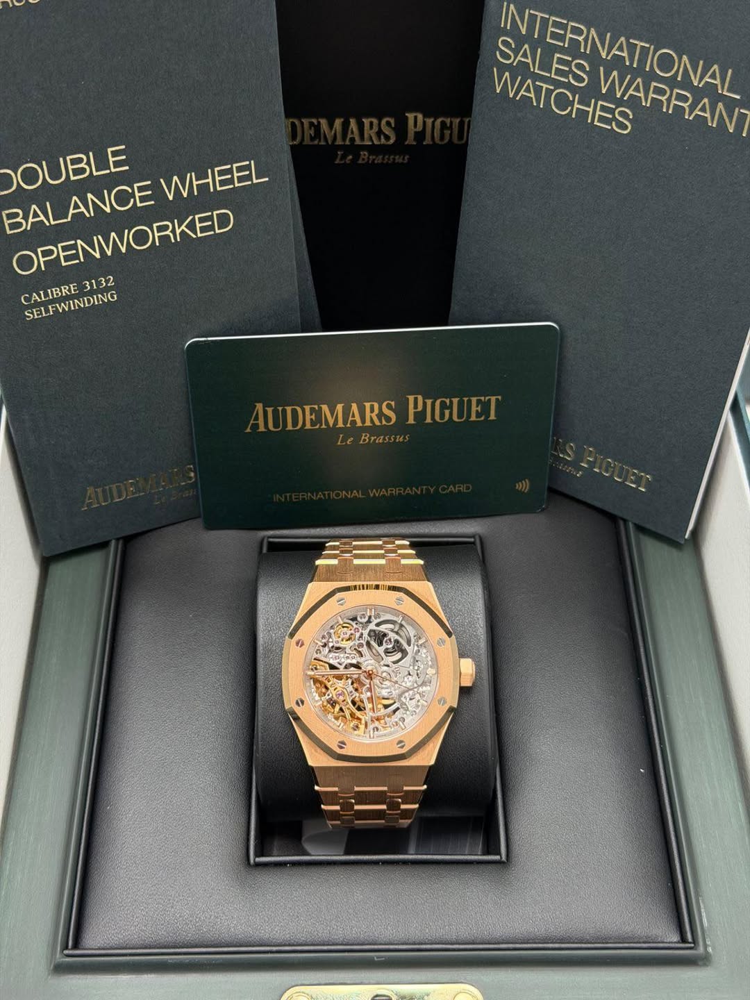 May be an image of wrist watch and text that says 'SALES WATCHES NIENATIONAL WARRAN WATCHES DOUBLE BALANCE WHEEL OPENWORKED 3132 CALIBRE CALIBRE3132 SELFWINDING AUDEMARSPIGUET AU…