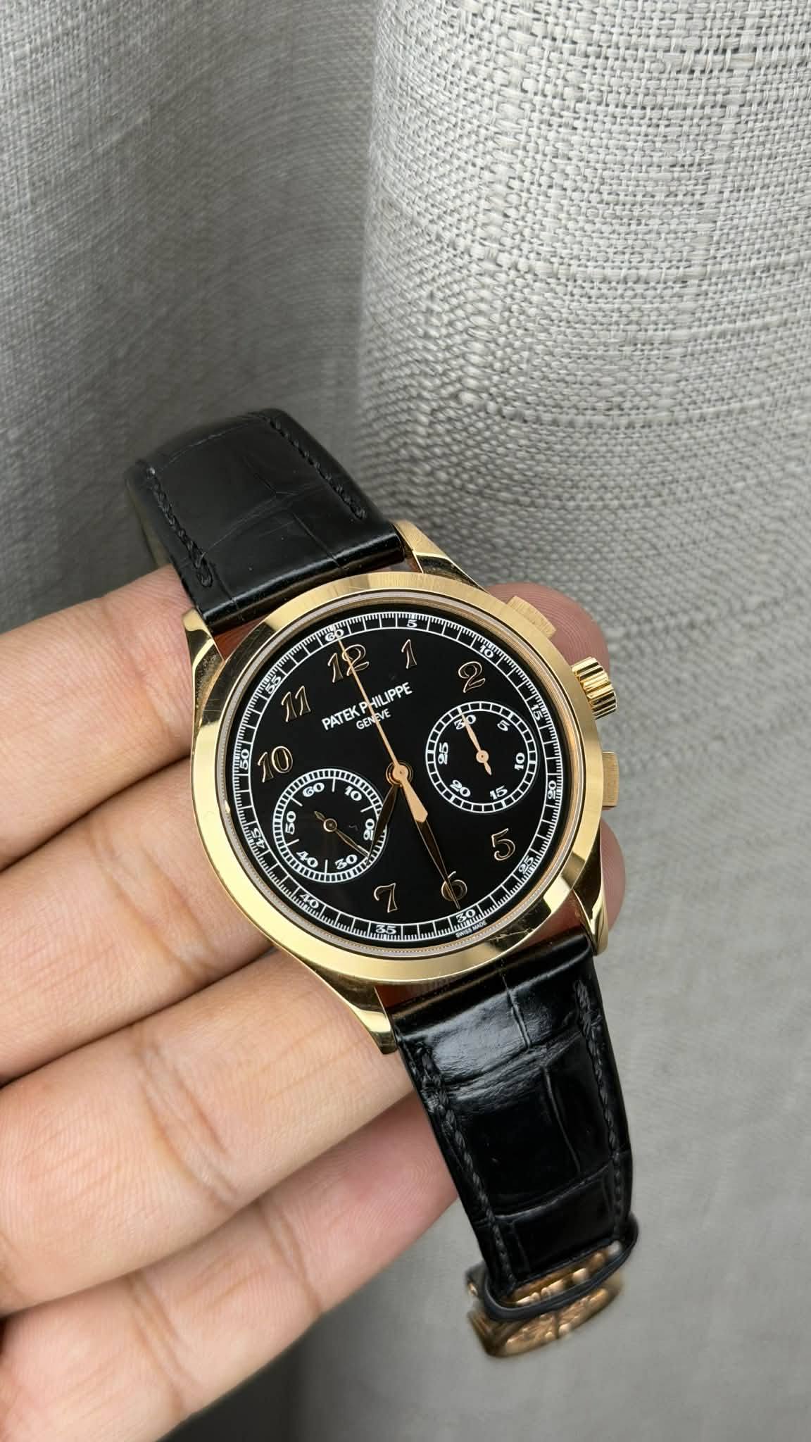 May be an image of digital watch and text