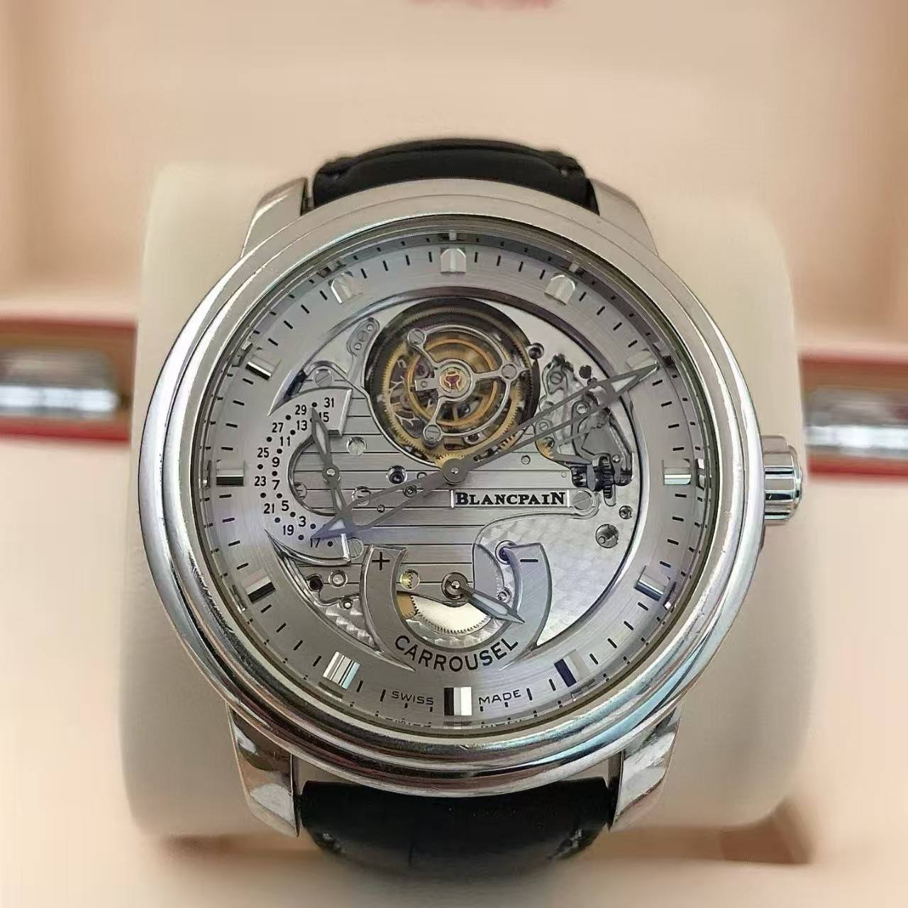 May be an image of wrist watch and text that says 'C I 9 9° 31 س 13' 6 2 21 a ف. فی |BLANCPAIN II ኢት ๑ II OUSEL SEL 小所 MADE!'