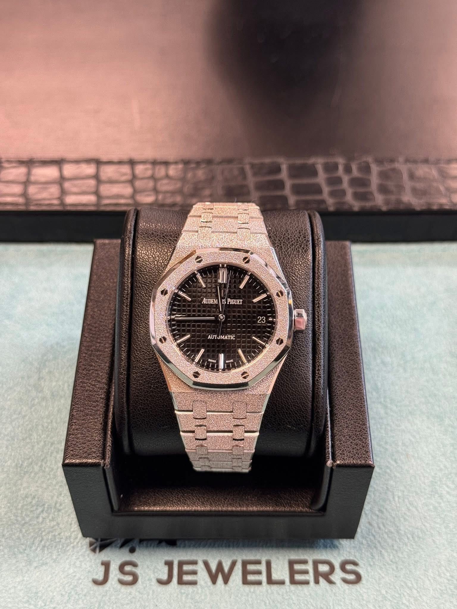 May be an image of wrist watch and text