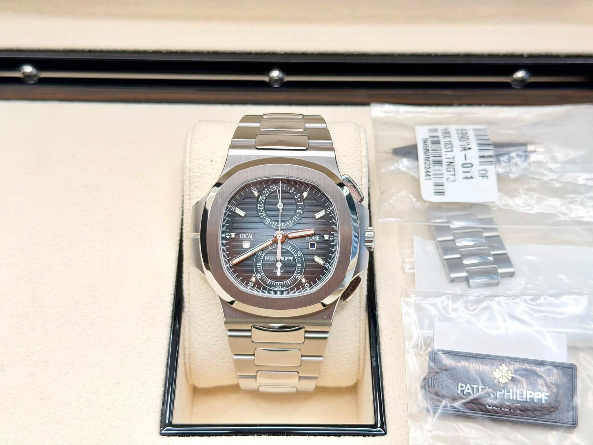 May be an image of wrist watch and text
