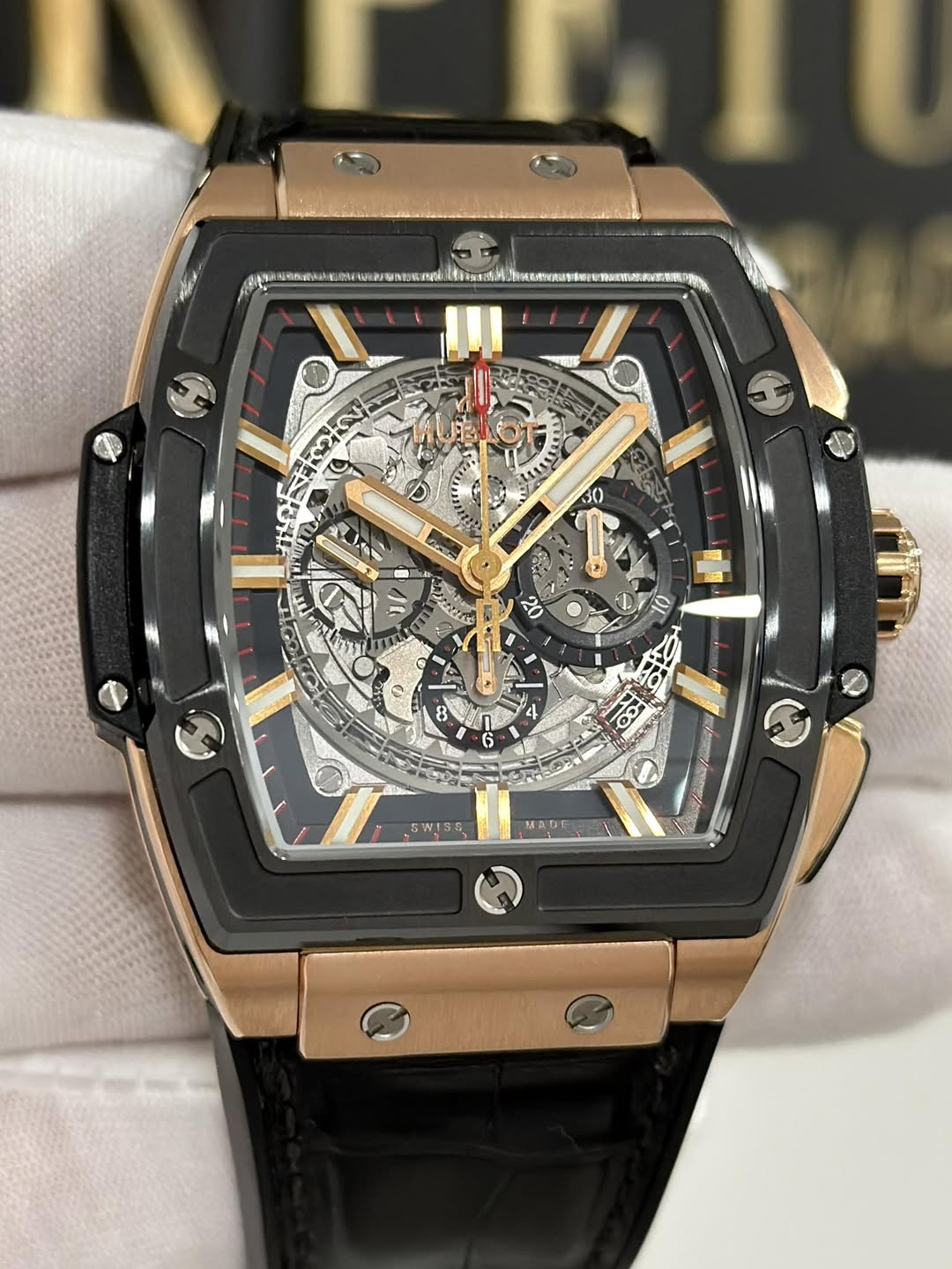May be an image of wrist watch and text
