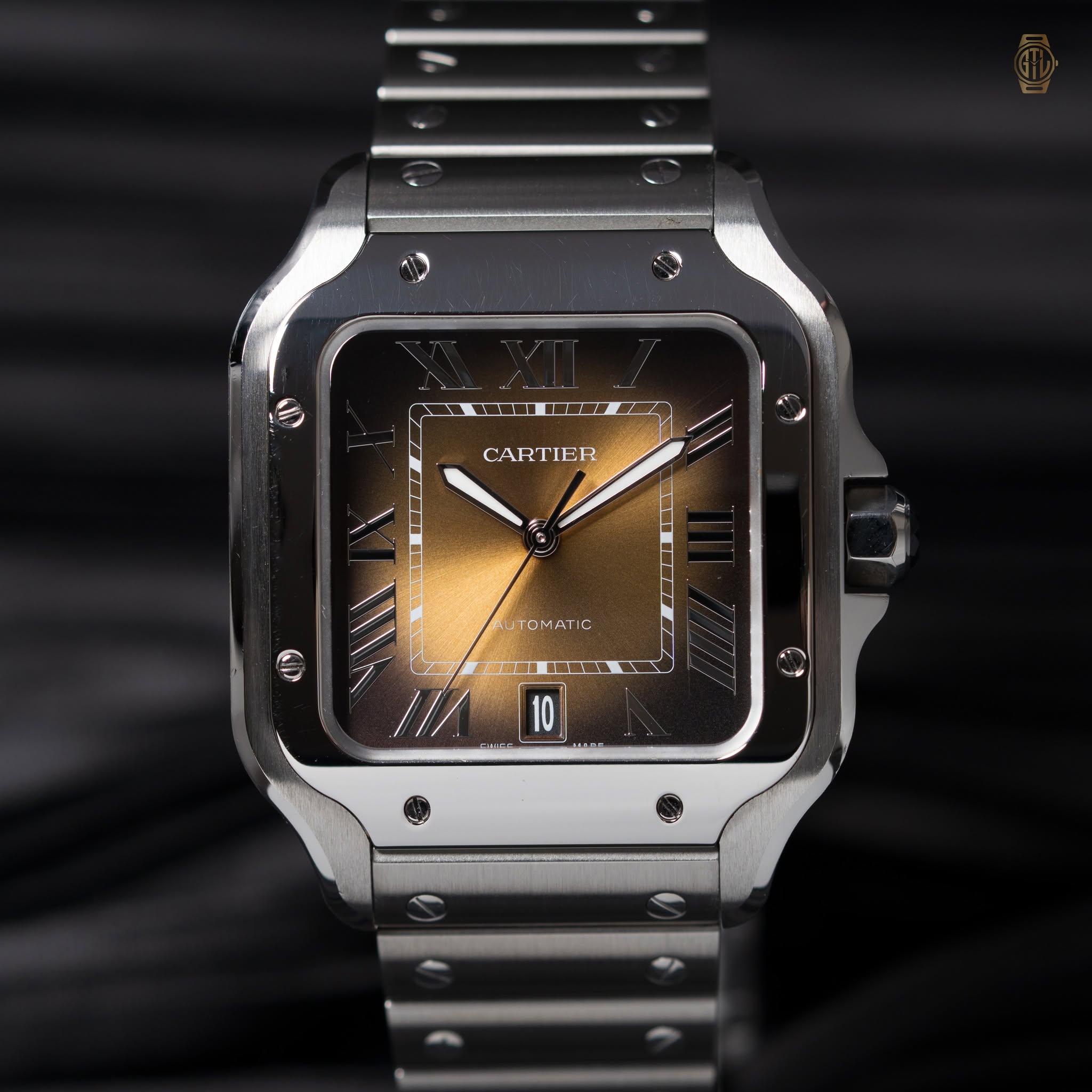 May be an image of digital watch and text that says 'CARTIER TOMATC R 10'