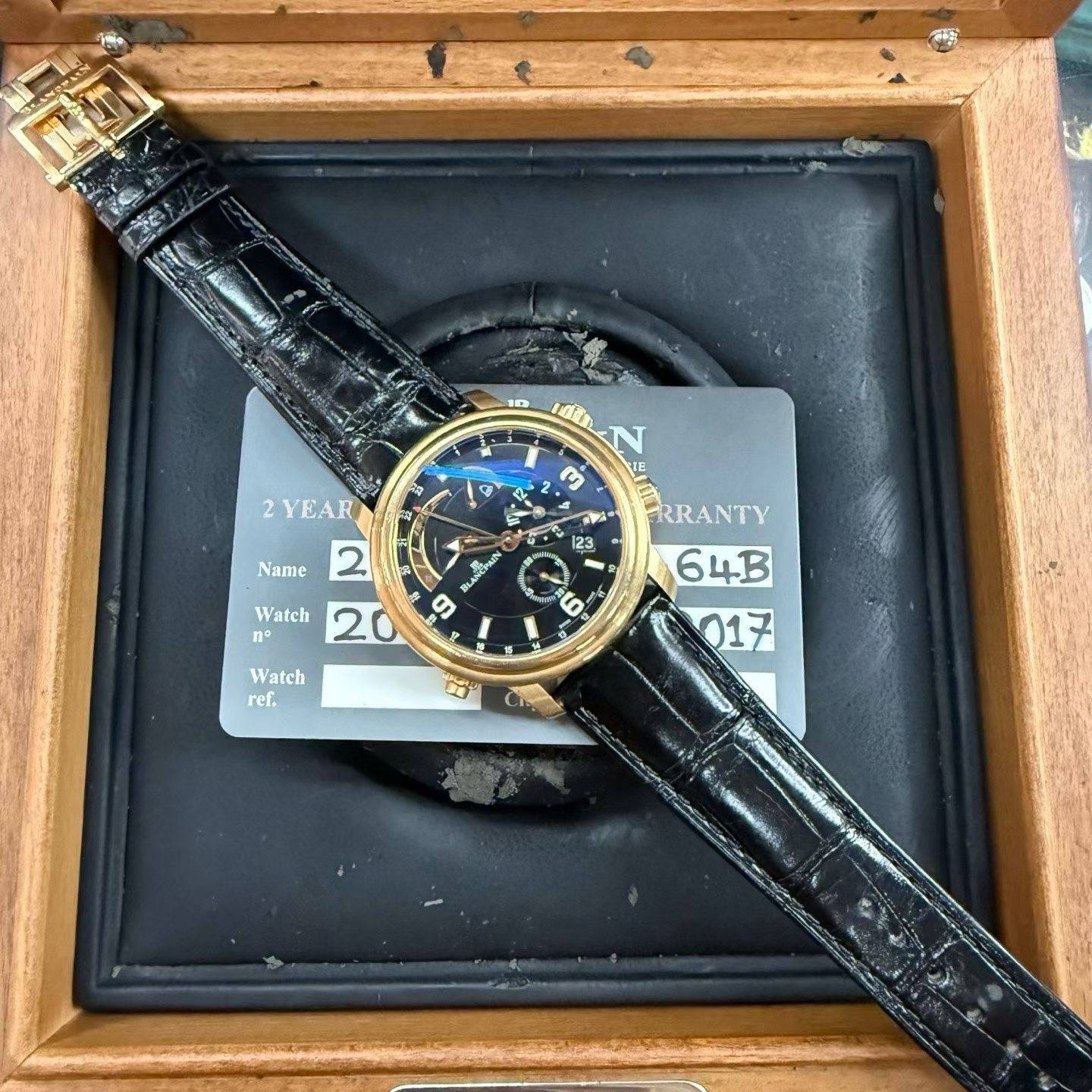 May be an image of wrist watch and text