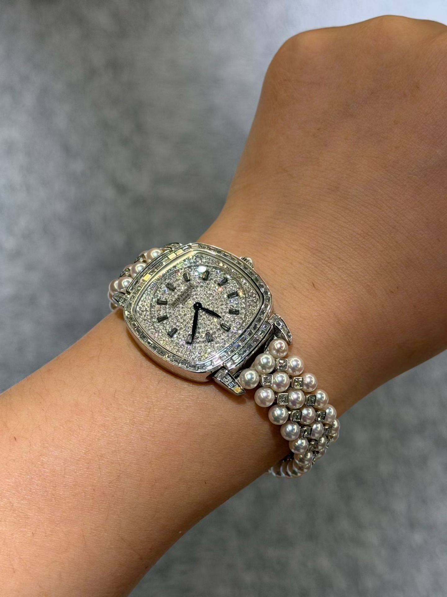 May be an image of jewelry and wrist watch