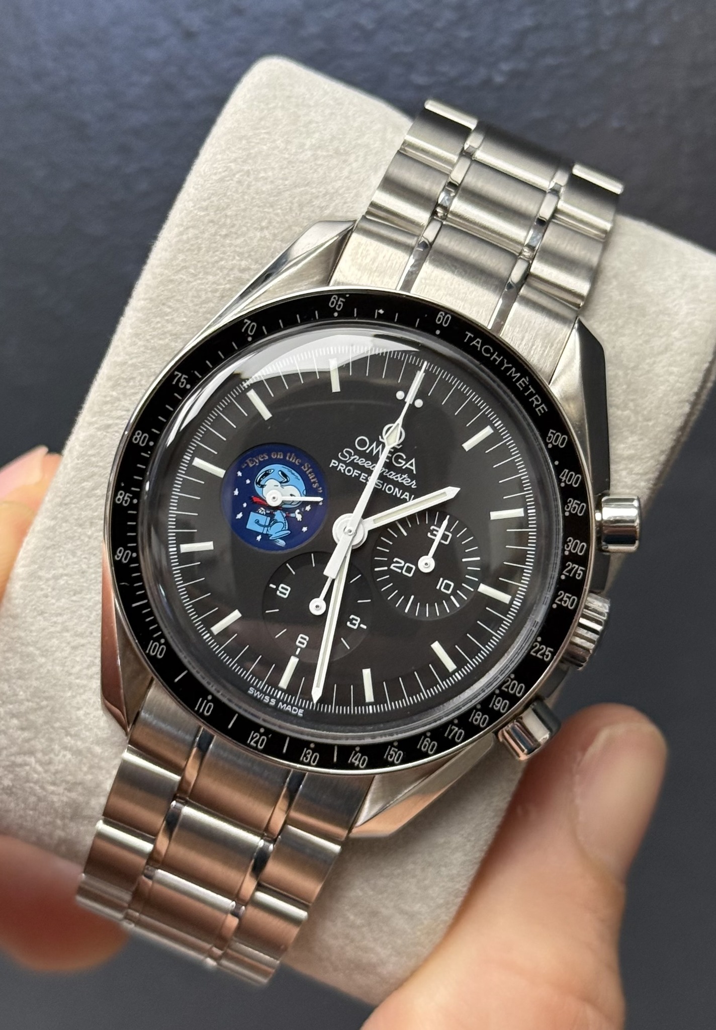 May be an image of wrist watch and text