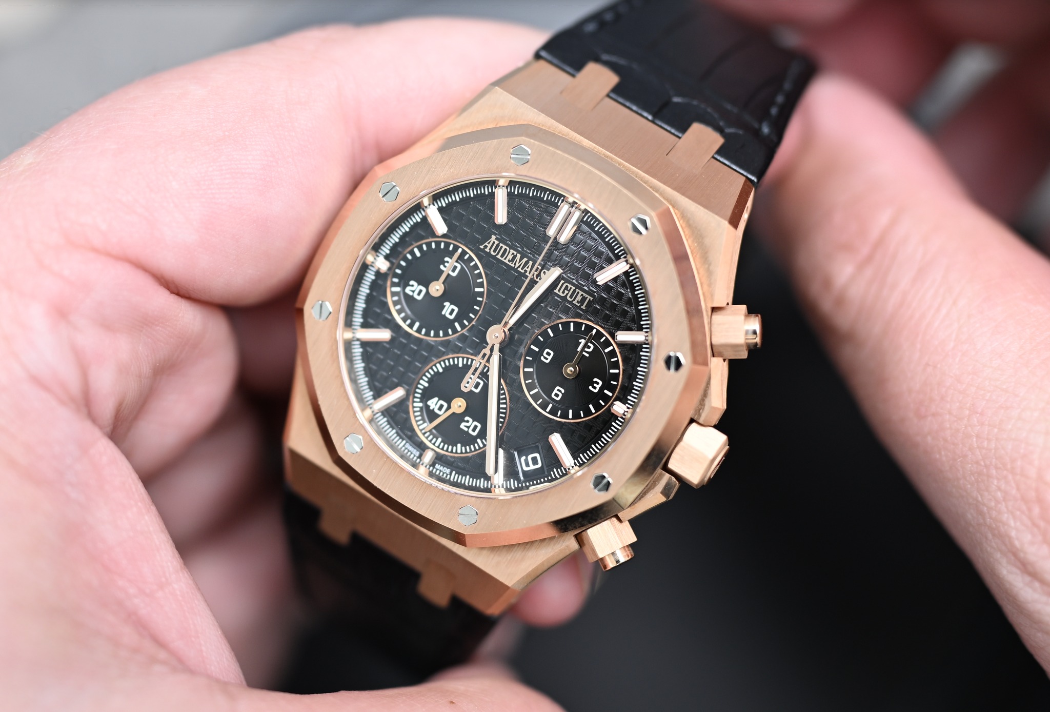 May be an image of wrist watch and text
