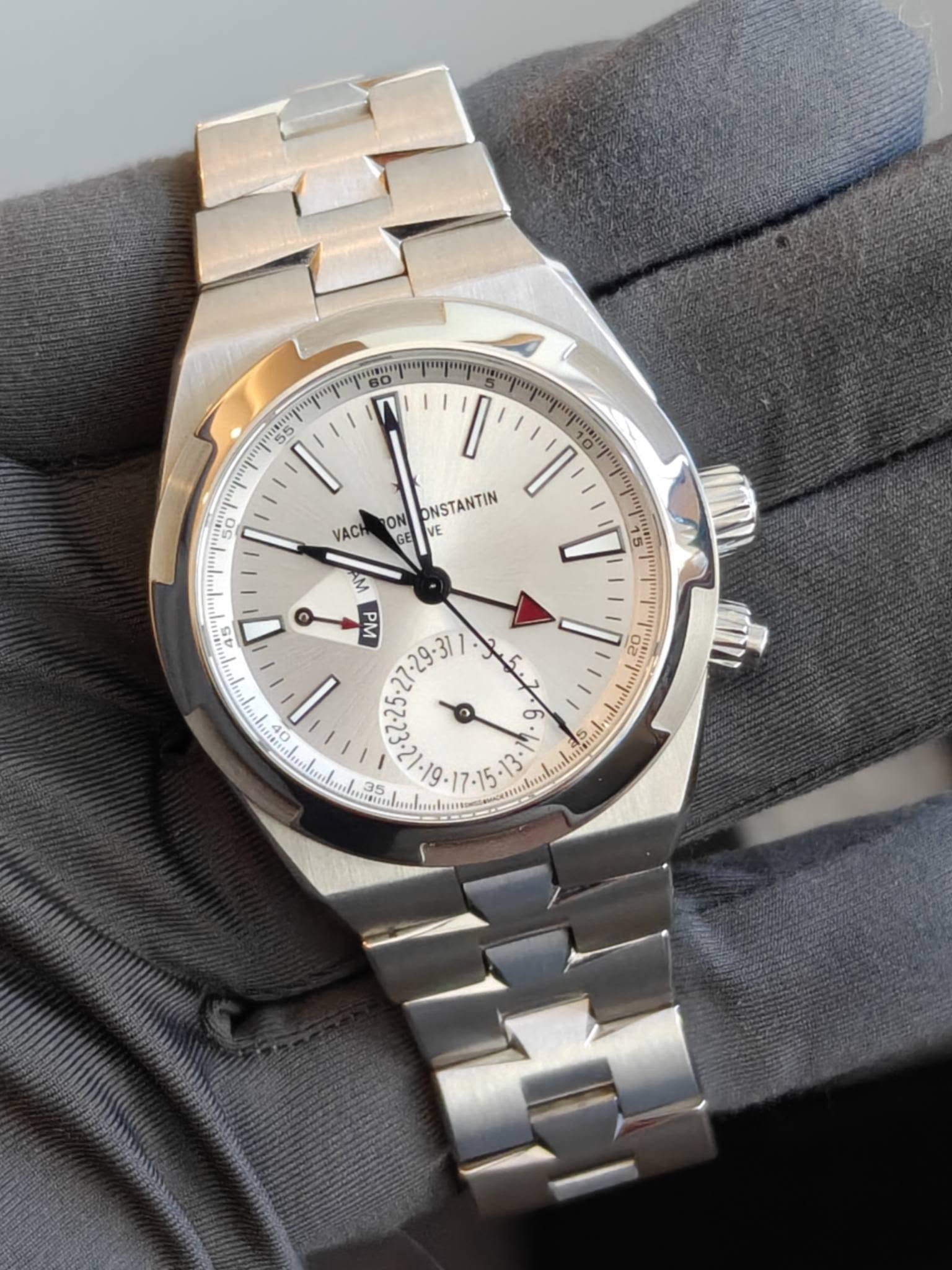 May be an image of wrist watch and text