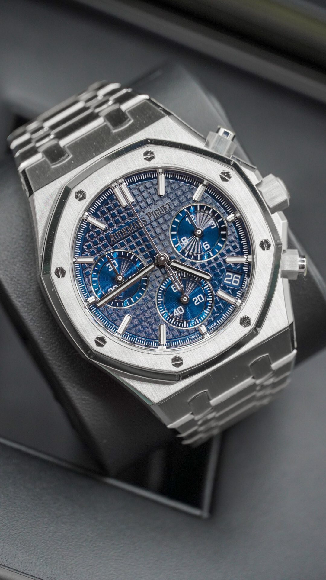 May be an image of wrist watch and text