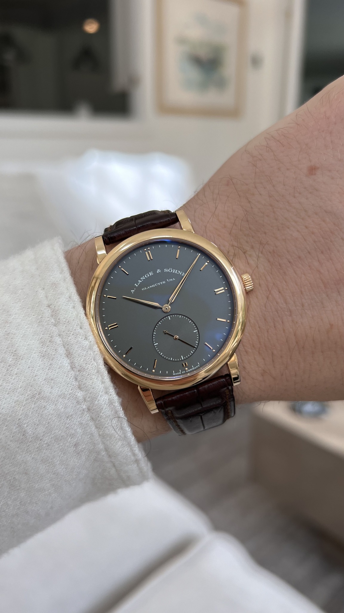 May be an image of wrist watch and text