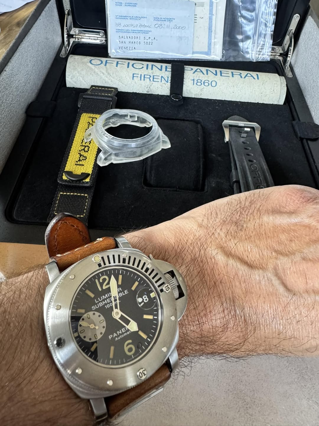 May be an image of wrist watch and text