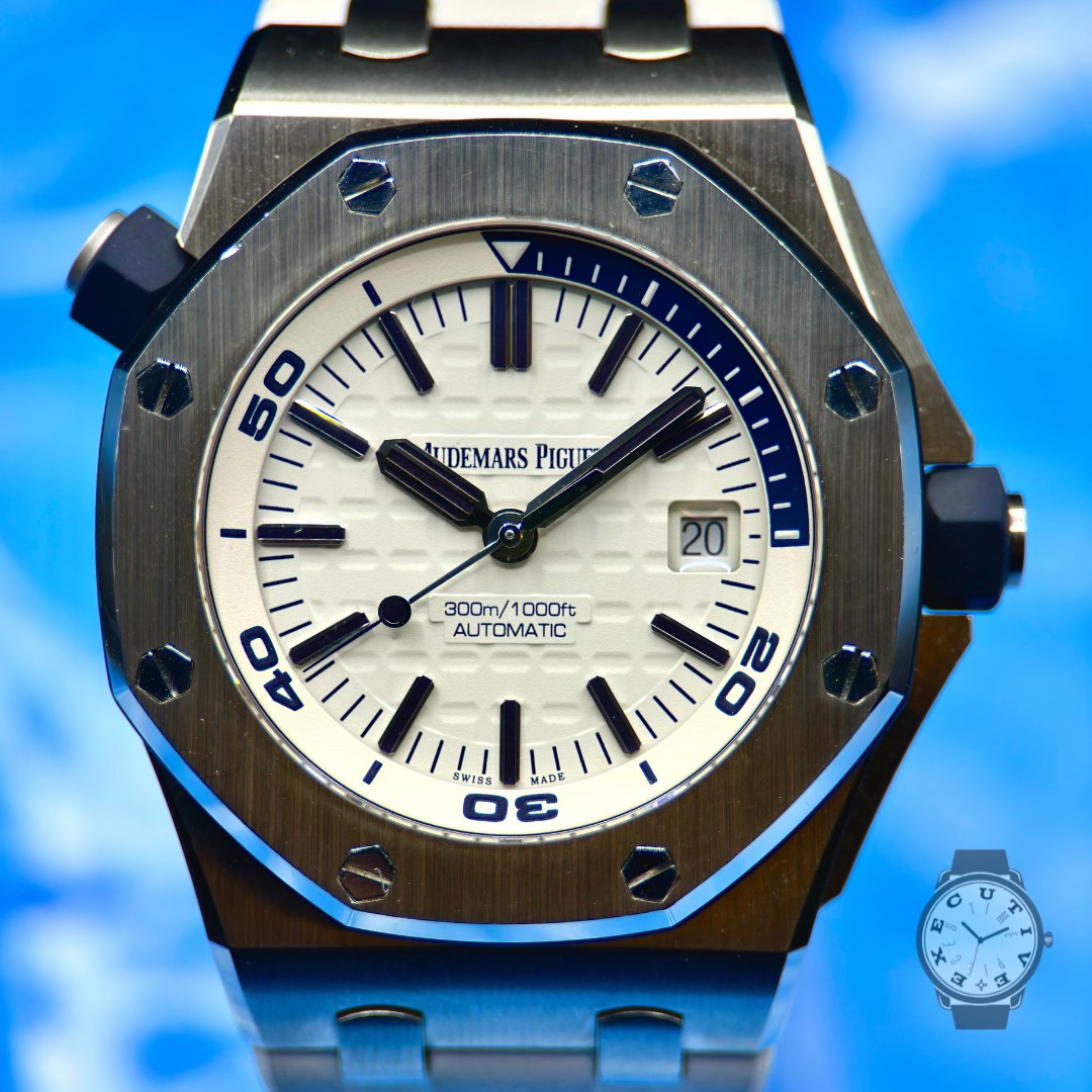 May be an image of wrist watch and text that says '50 UIDEMARS PIGU 20 3D0m/ 300m/1000ft 1000ft AUTOMATIC 40 2 WISS 古灣 DE AD MADE A 仙 ਤੇ'