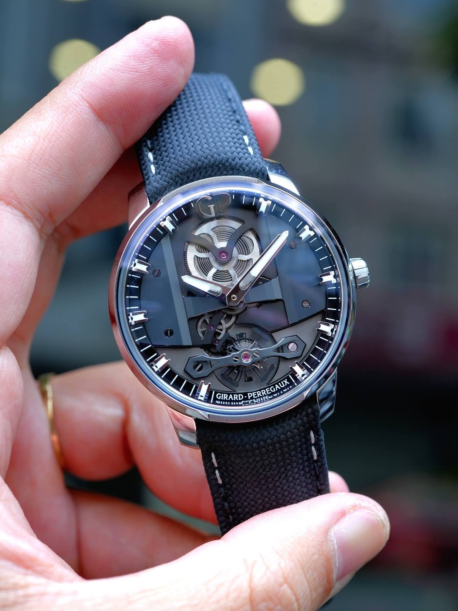 May be an image of wrist watch and text