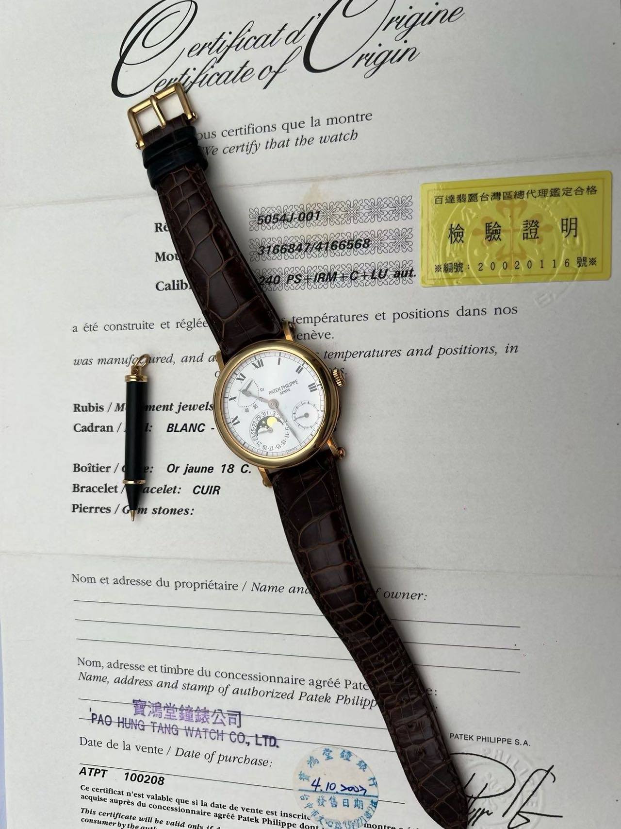 May be an image of wrist watch, leather and text