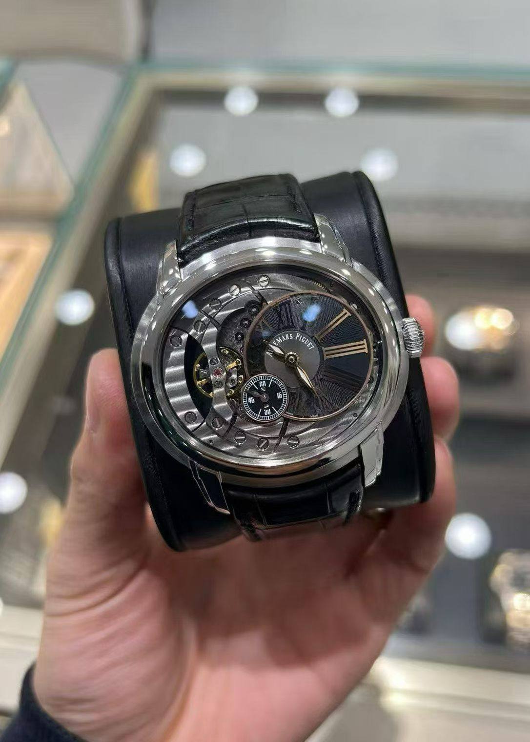 May be an image of wrist watch and text that says 'A MARS IGUET'