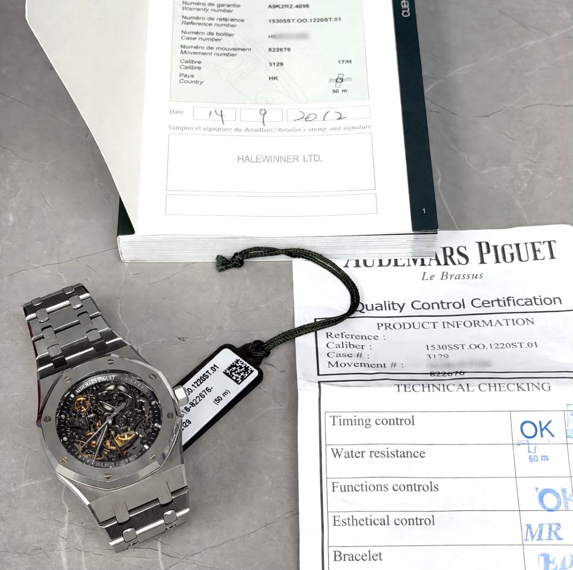 May be an image of digital watch and text that says 'A9K2R2. merodeboter 153055T.00.12205T.0 ថ Calbre Calbre 822676 Country 3129 HИ 17/M Date Tampon gnature u etaillant Retuiler's…
