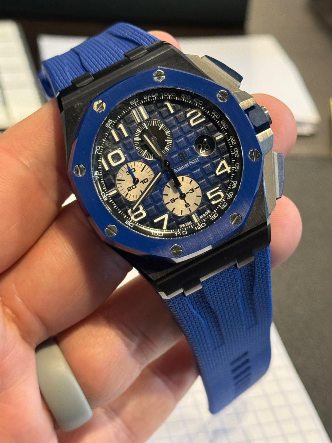 May be an image of wrist watch and text