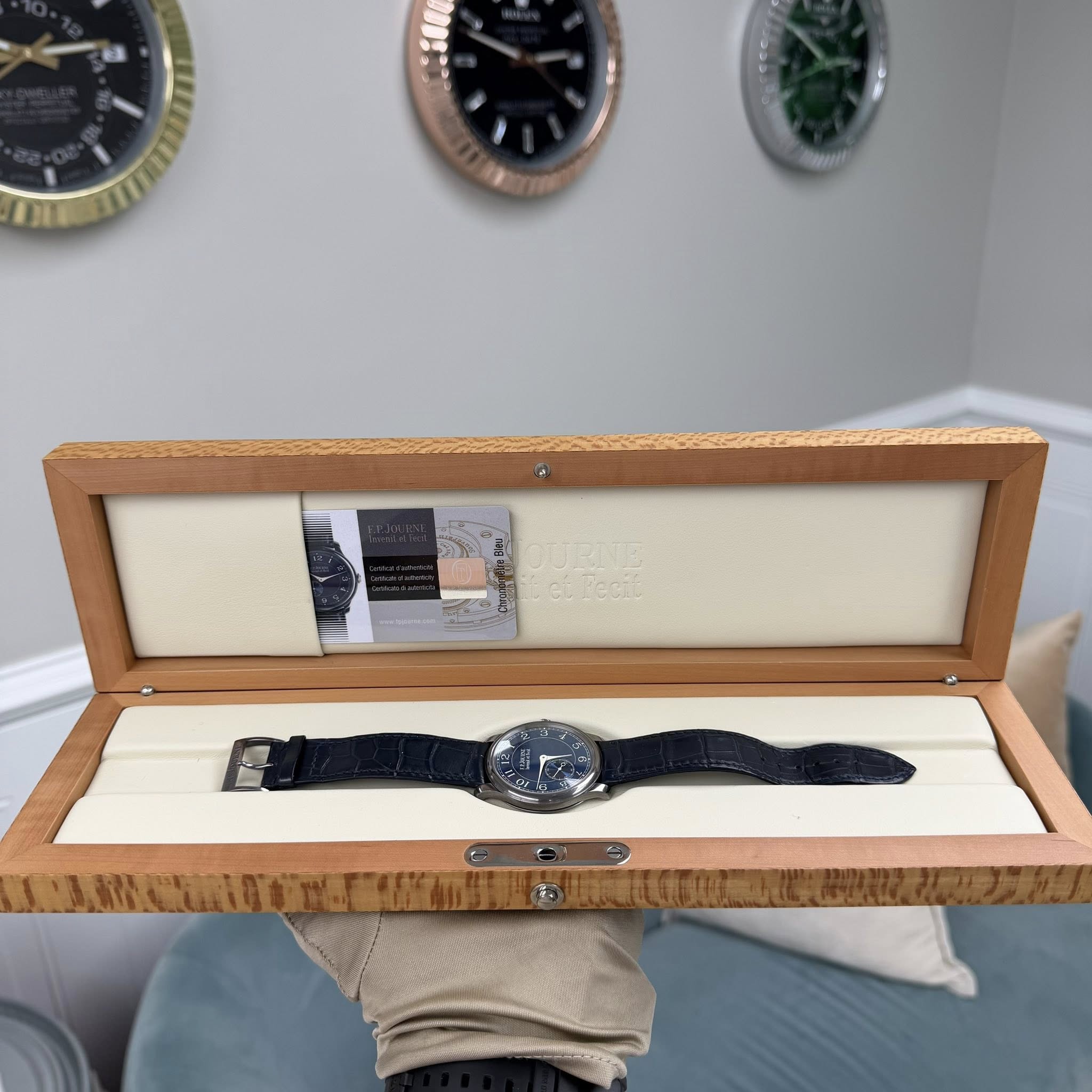 May be an image of wrist watch and text