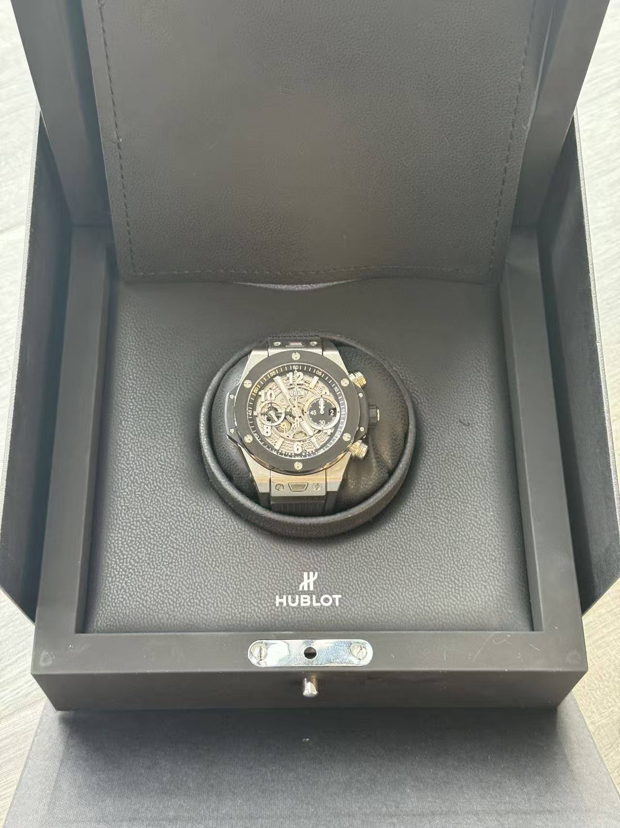 May be an image of wrist watch and text