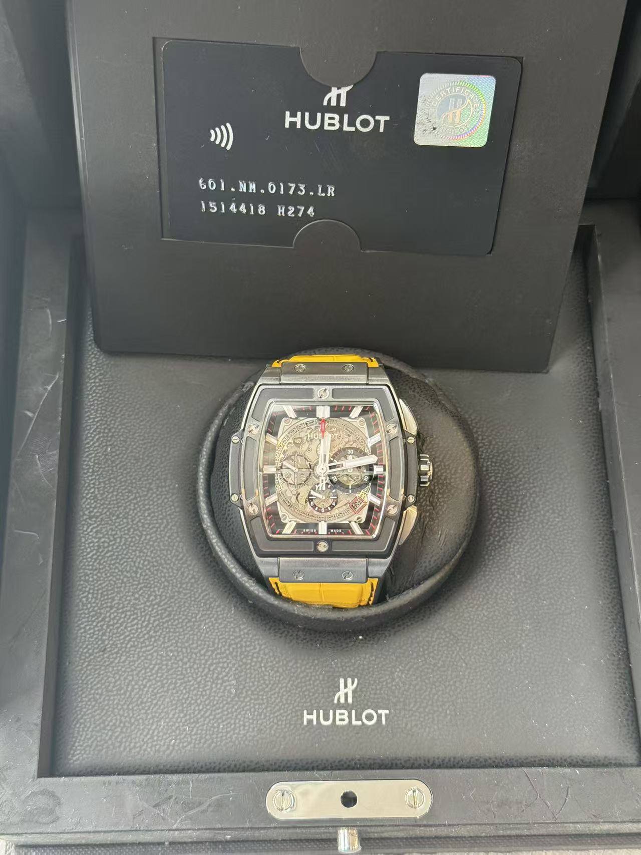 May be an image of digital watch and text that says 'ሐ HUBLOT 出 661.NH.0173.LR LR .LR 1514418 1514418H274 He74 בך 대 الما ምዝቲ ውጃ 金 ® ۹ل HUBLOT'