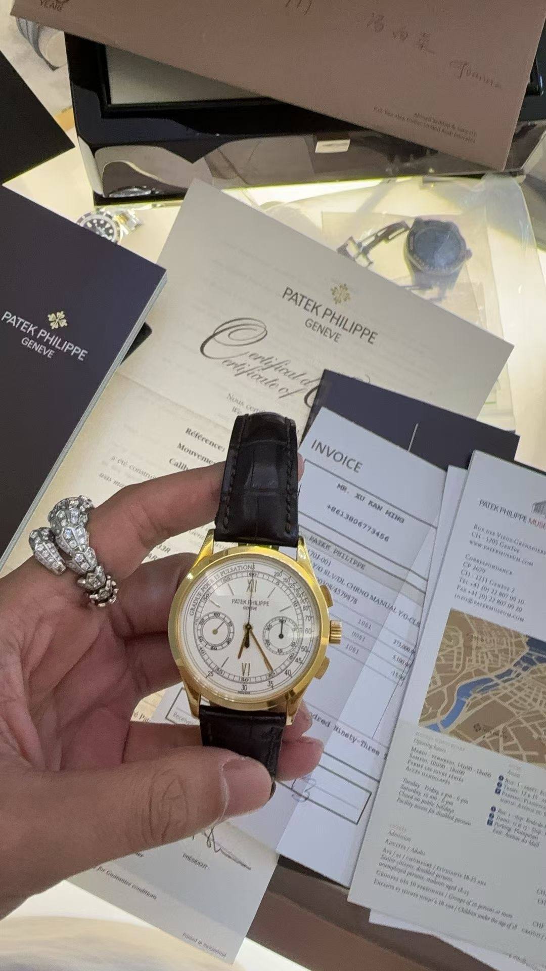 May be an image of wrist watch and text