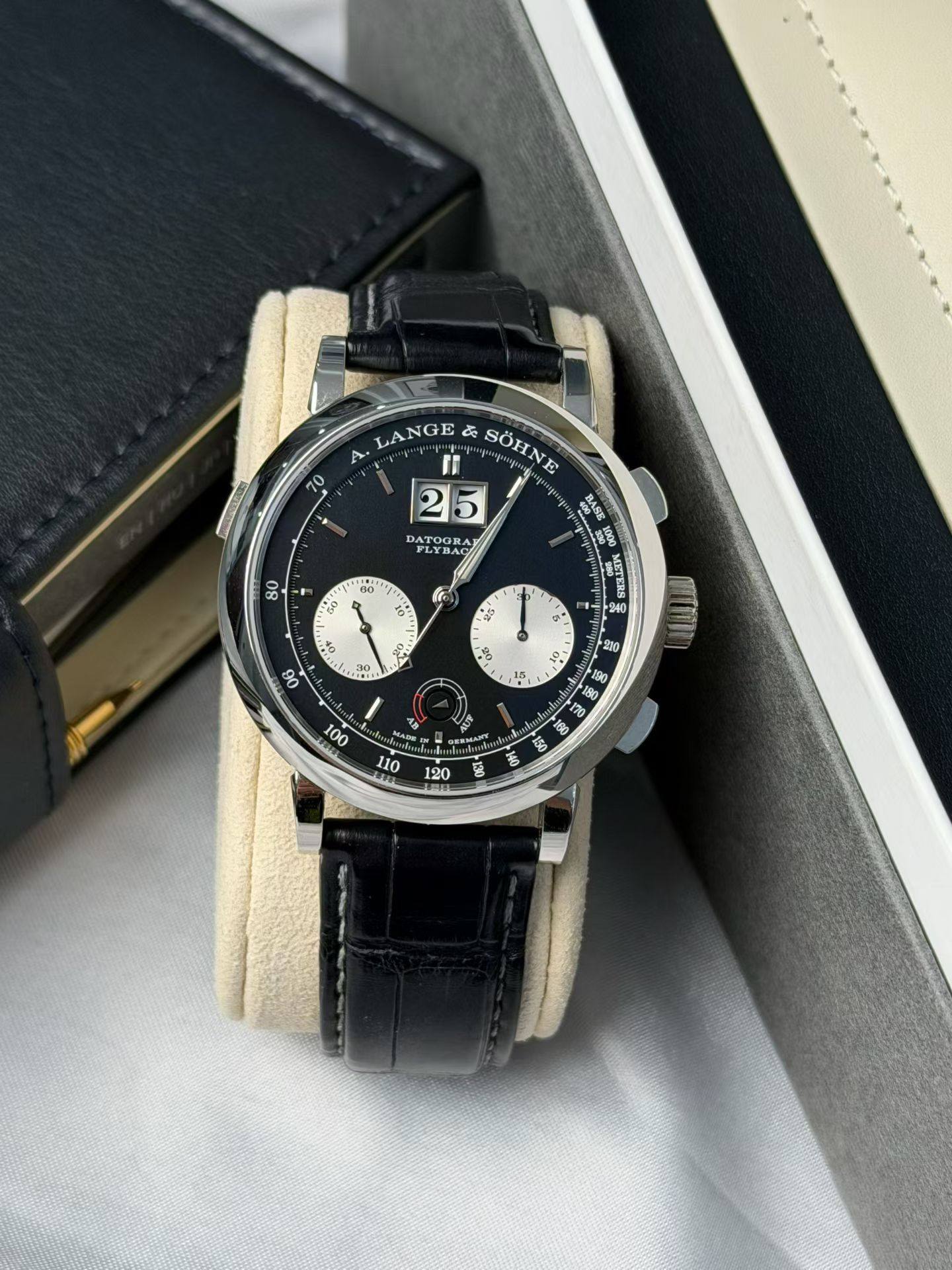 May be an image of wrist watch and text