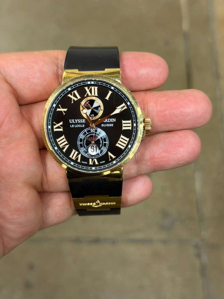 May be an image of digital watch and text