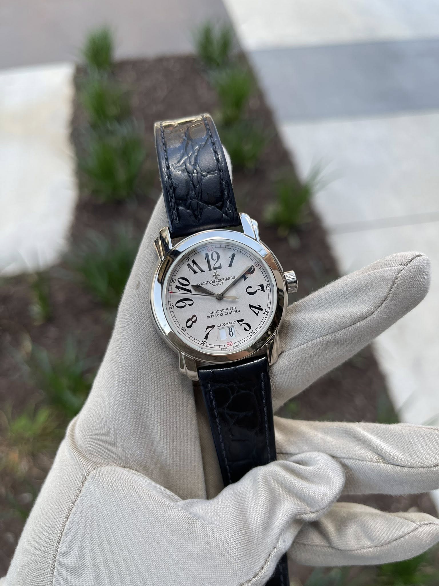May be an image of wrist watch and text