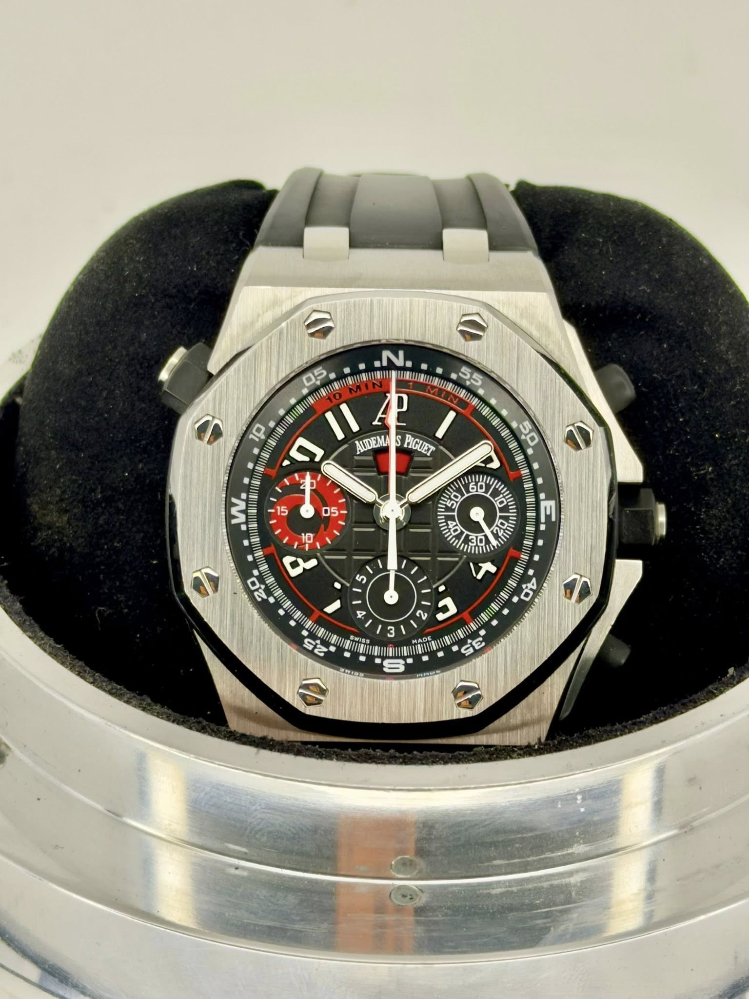 May be an image of wrist watch and text