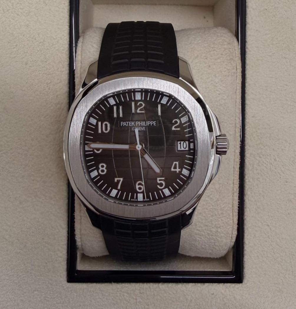 May be an image of wrist watch and text that says '1112 II 12 10 PATEK 10 PATEKPHILIPPE PHILIPPE 2 D 10 III '