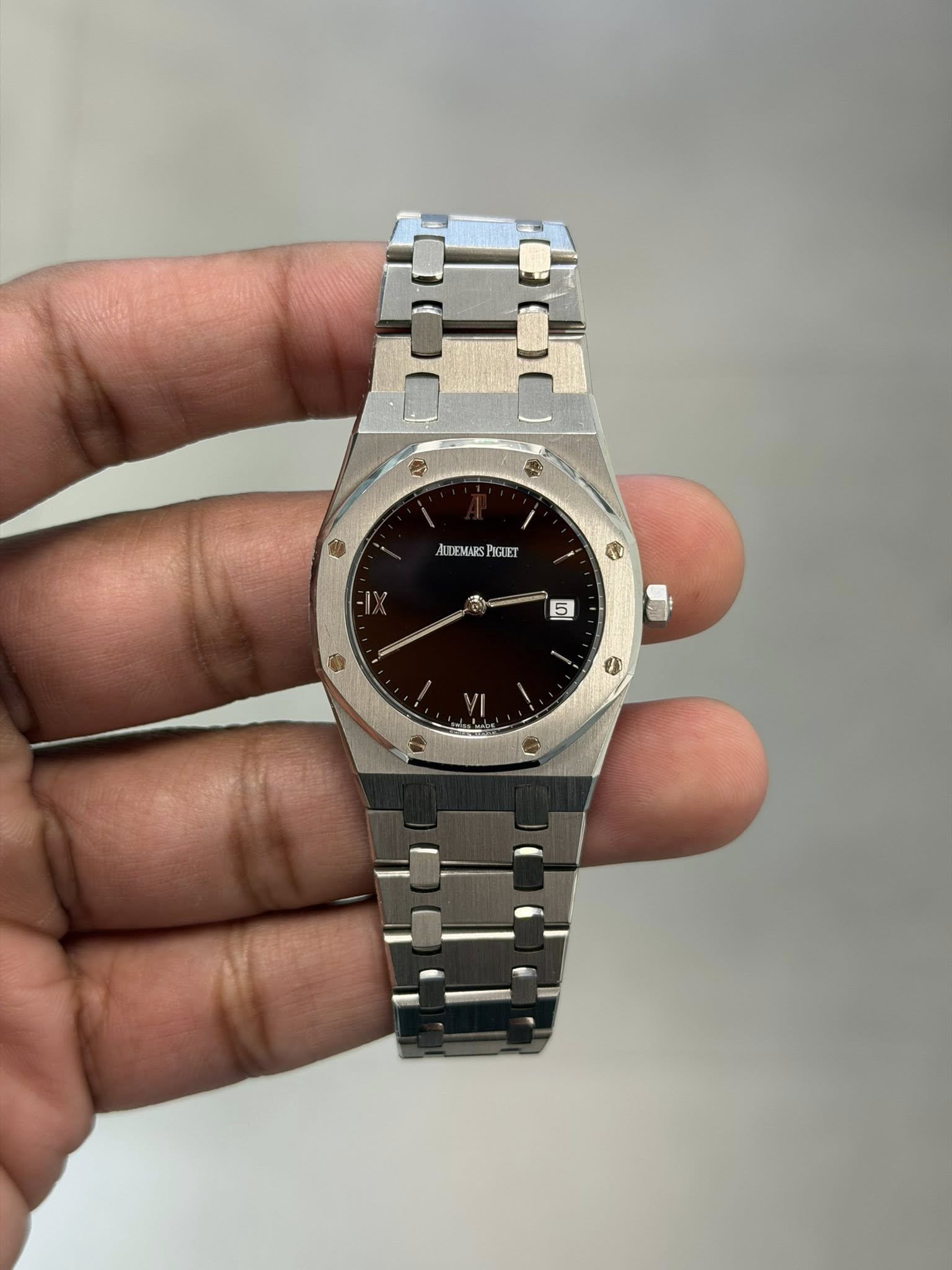 May be an image of digital watch and text