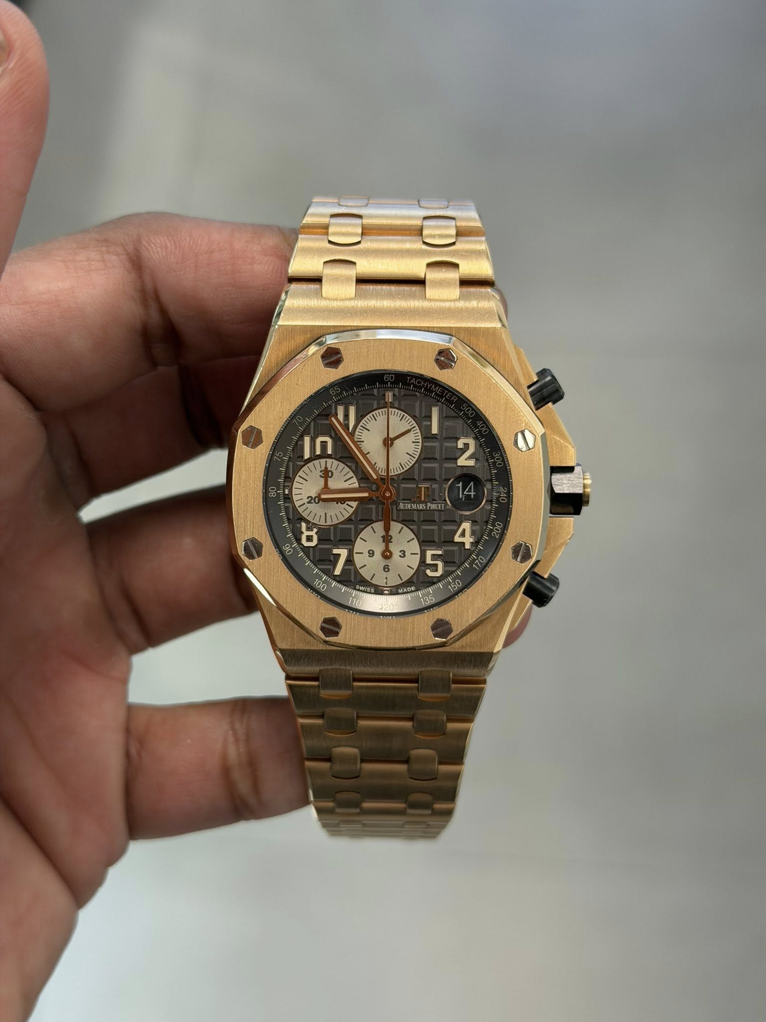 May be an image of wrist watch and text