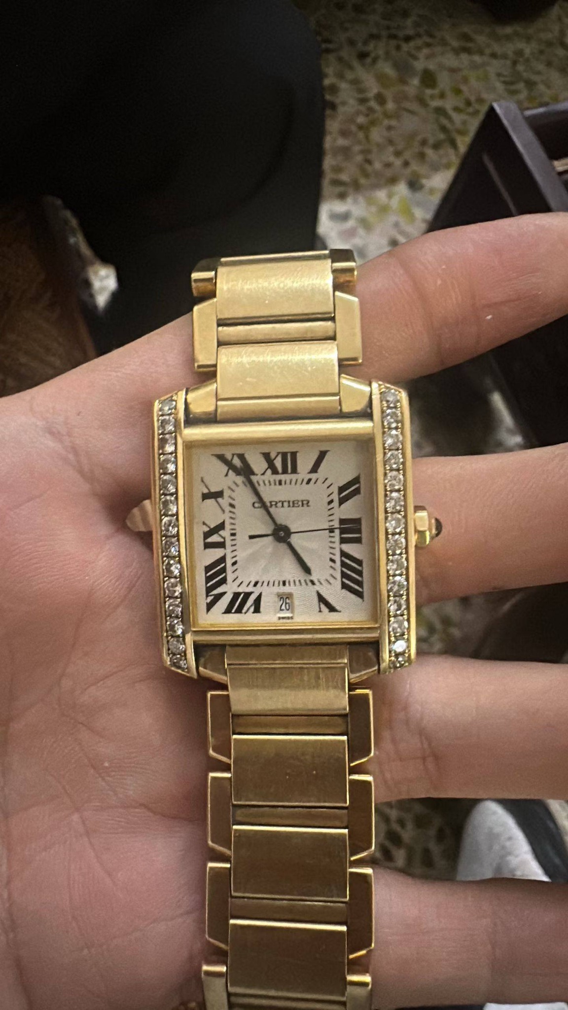 May be an image of digital watch and text