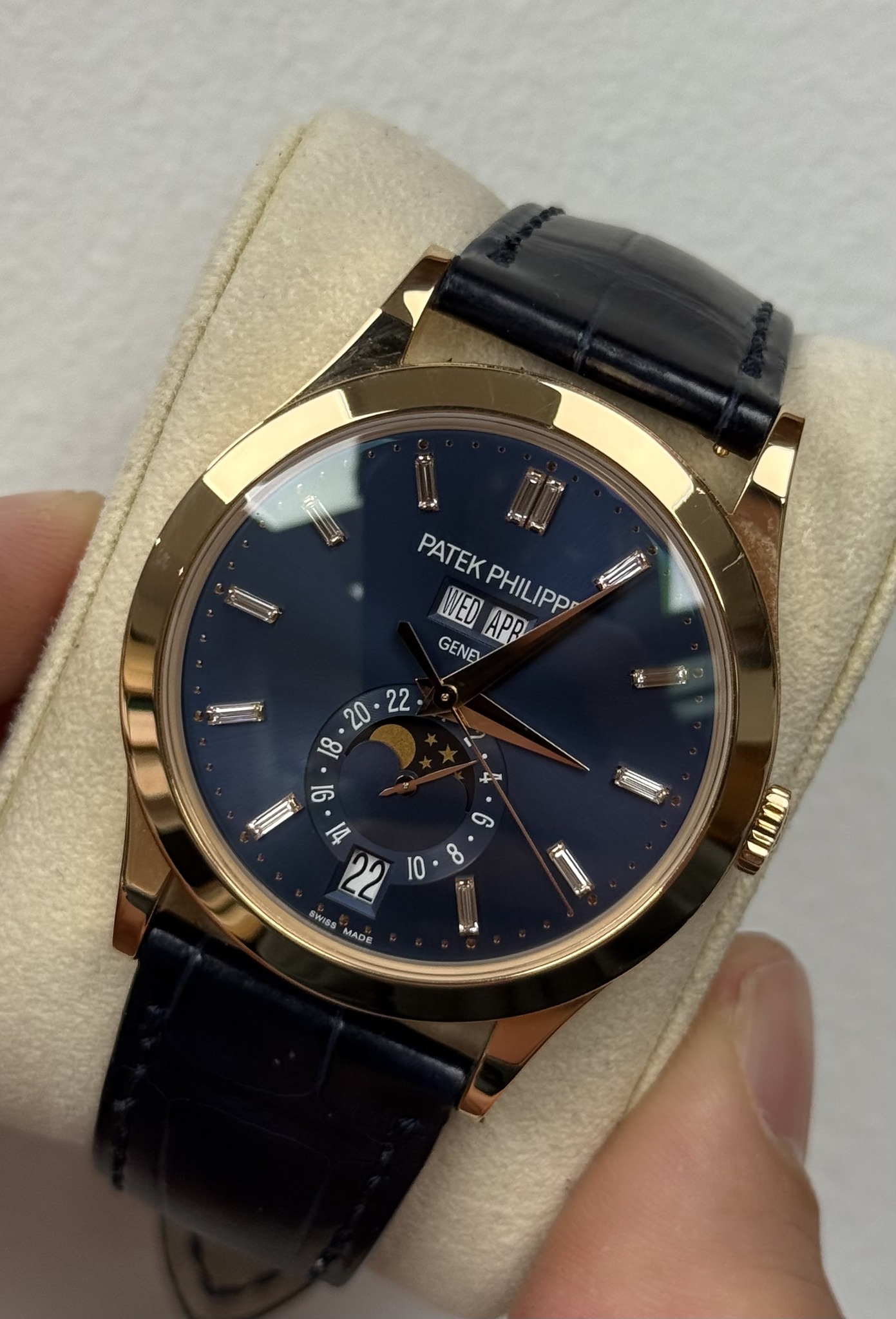 May be an image of wrist watch and text