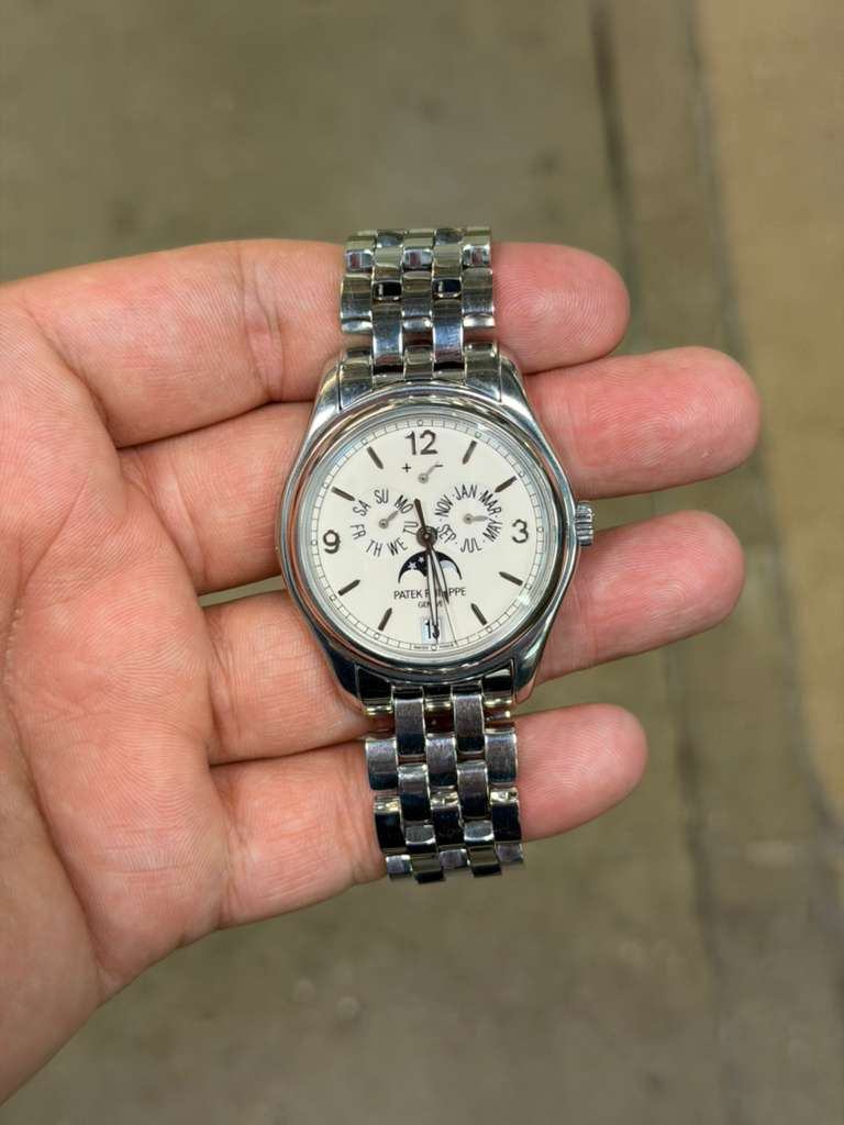 May be an image of wrist watch