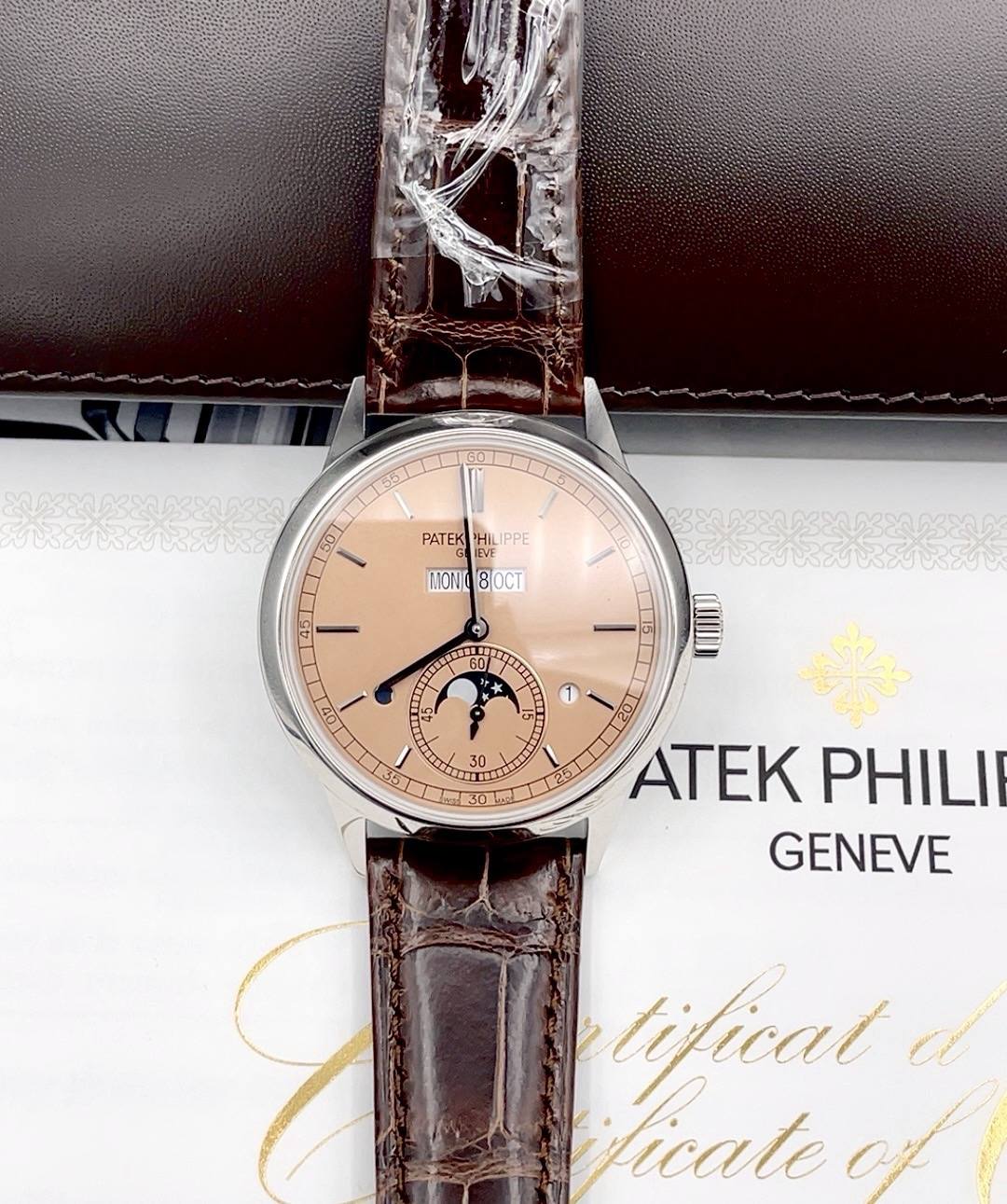 May be an image of wrist watch and text