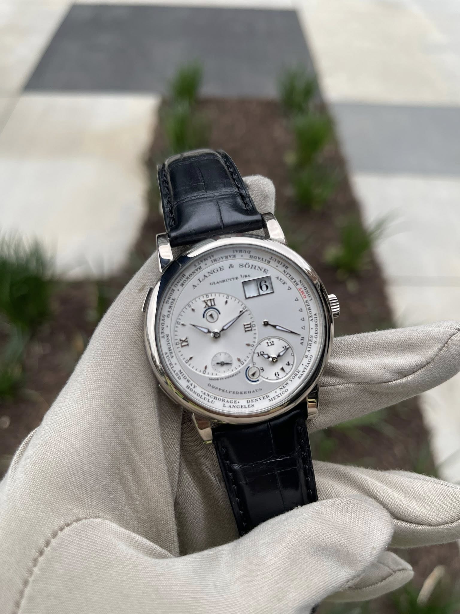 May be an image of wrist watch and text
