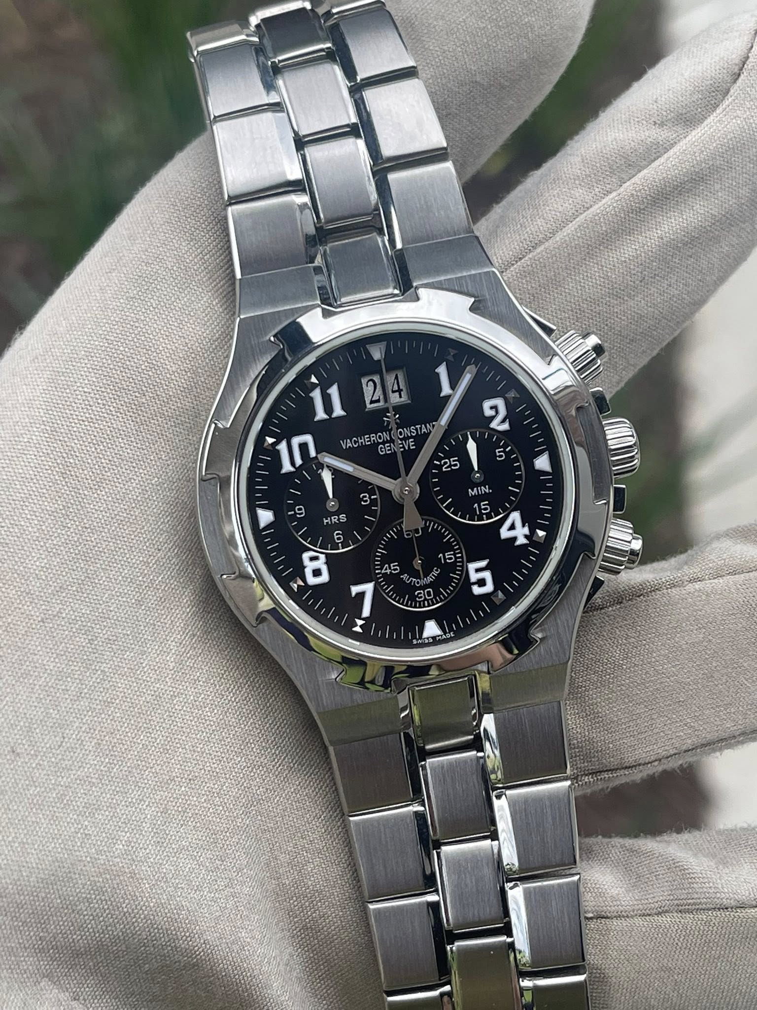 May be an image of wrist watch and text that says '11241/2 ONSTAN ሃ. MIN. 4 5 5 RS 6 E45 ل 8 7 X'