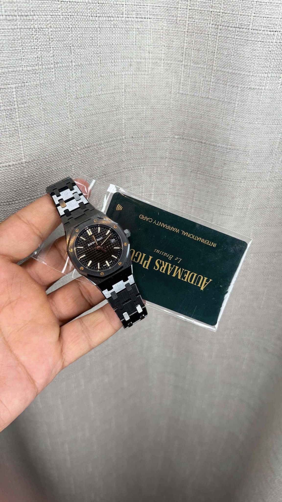 May be an image of wrist watch and text