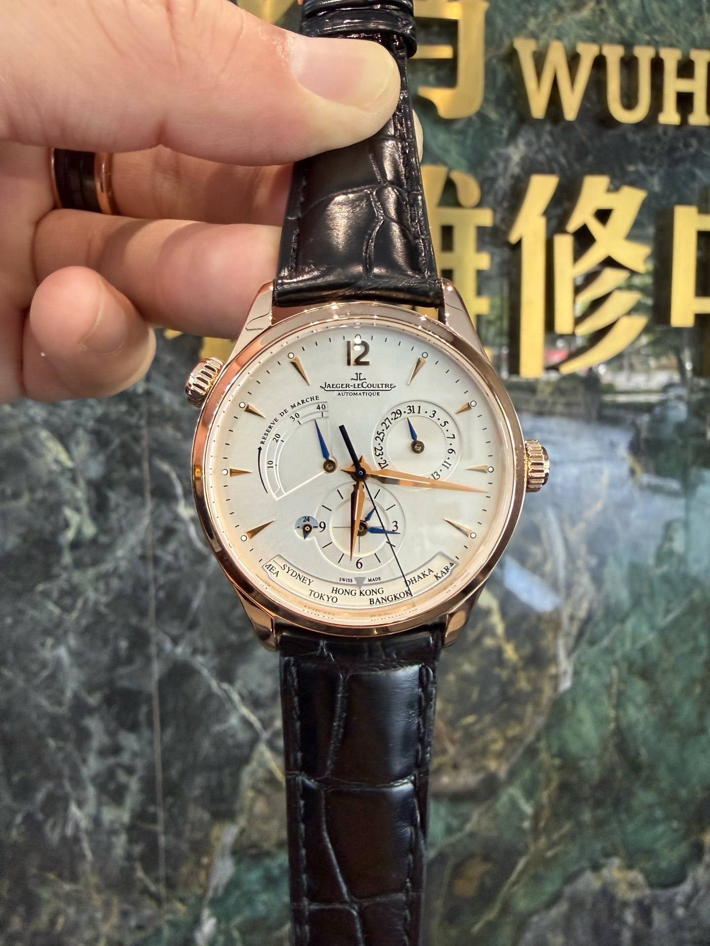 May be an image of wrist watch and text