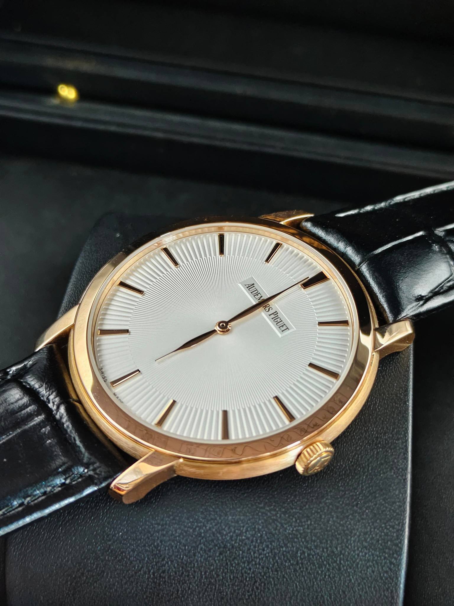 May be an image of wrist watch and text