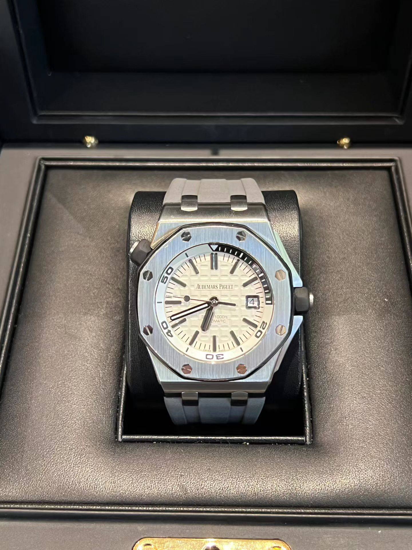 May be an image of wrist watch and text