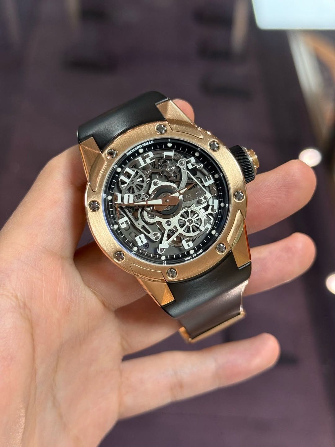 May be an image of wrist watch and text