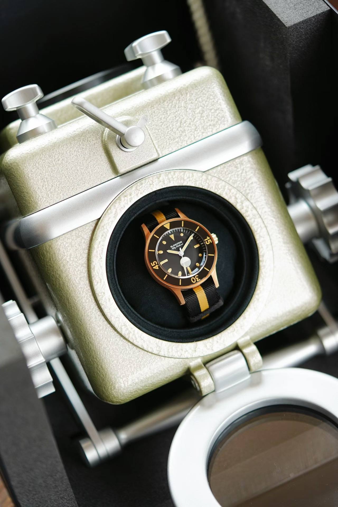 May be an image of wrist watch and text