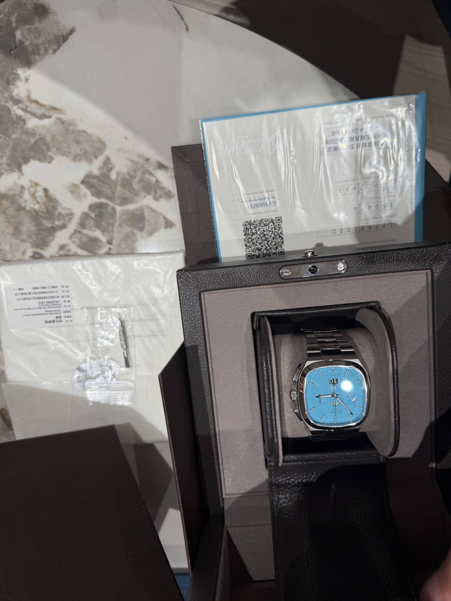 May be an image of digital watch and text
