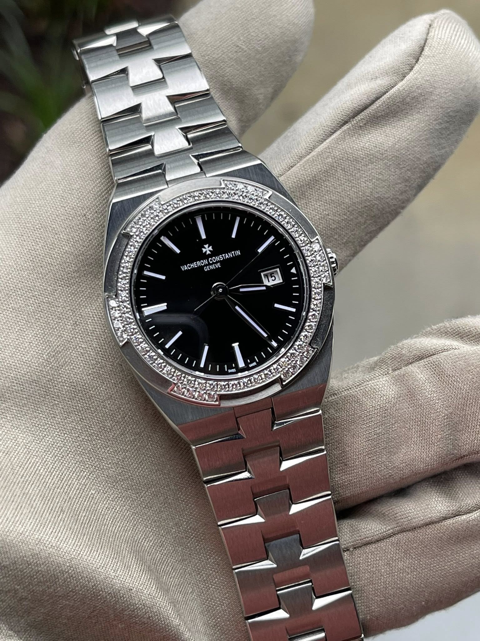 May be an image of wrist watch and text